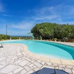 Casa Ginepro Piscina E Vista Mare Lejlighed Aglientu